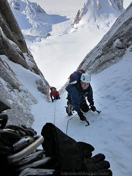 Jay Abbey and Erik Weihenmayer heading up Ham & Eggs Couloir on the Moose's Tooth in Alaska. Photo by Ian Osteyee.