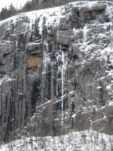 The Big Wall section of Poke-O. The thin strip of ice is the new route "Endangered Species" (Horner/McCormick/Russel). Photo by Jim Lawyer