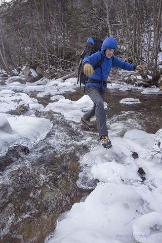 Ryan Stefiuk steps lightly on the brook crossing to reach Mont Gros Bras (Big Arm) in Quebec.