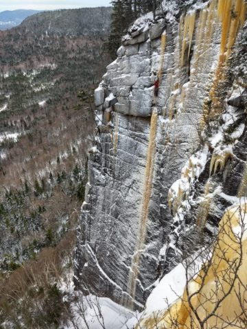 Shawn Bunnell leading the classic hard ice route, Valhalla (WI6), in New Hampshire.