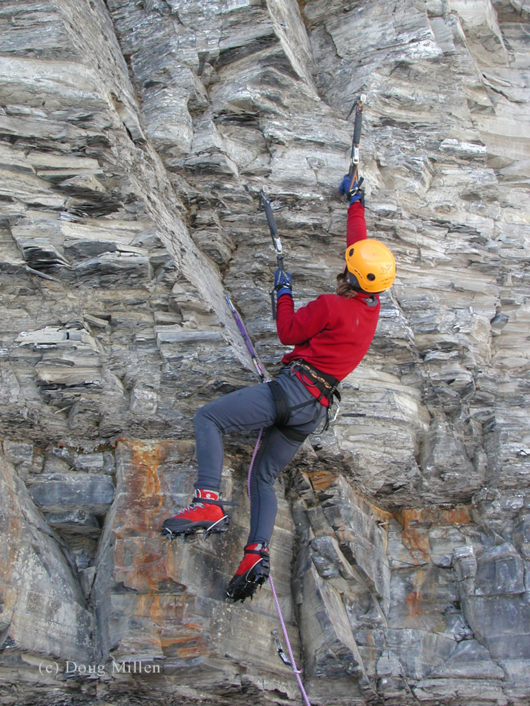 Kim Csizmazia navigating the varied and loose shale of Pont Rouge during the mixed climbing competition. Note the leashes on the tool