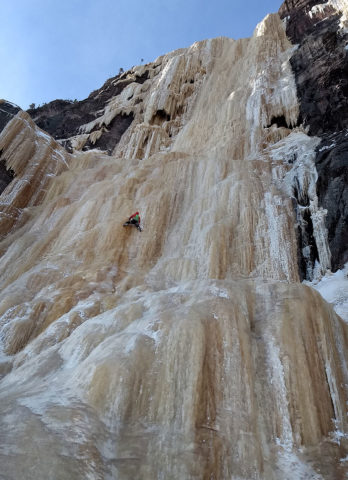 Pellett on a solo ascent of “Simon Proulx”, WI5, 550’, in 2018. Photo by Ryan Stefiuk.